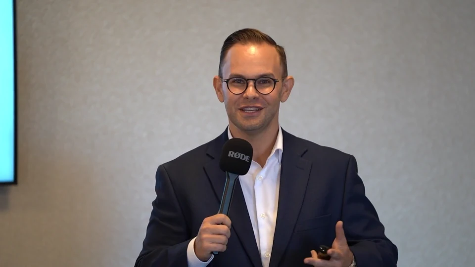 Jason Baron sharing practical ways to get started with AI